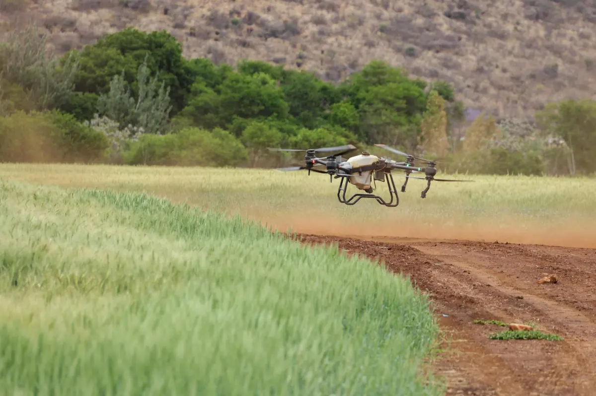 Agricultural drone flying over farmland