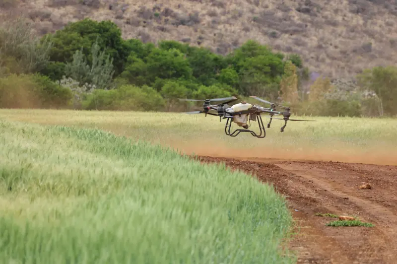 Agricultural drone flying over farmland