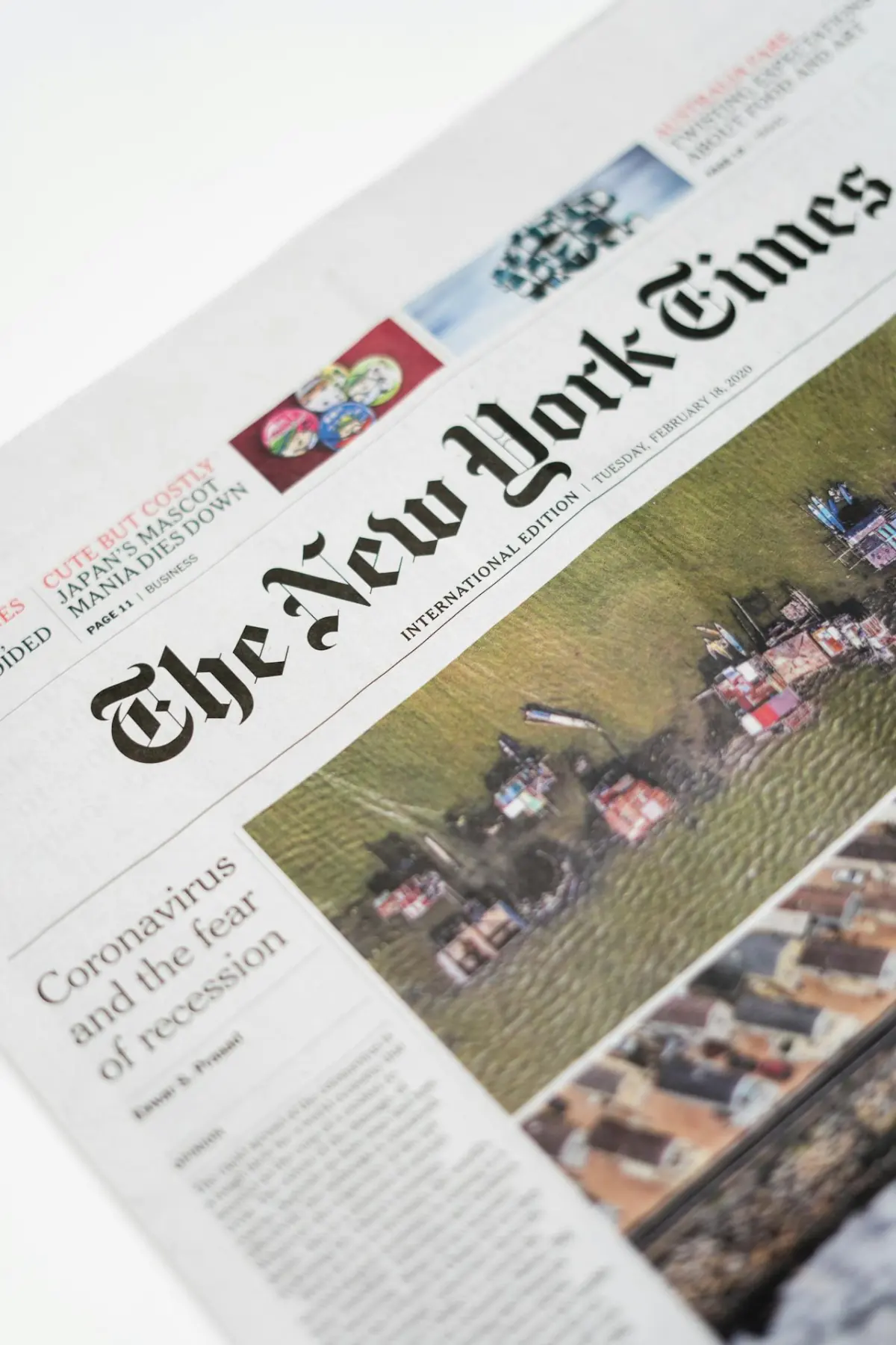 Newspaper front page covering global economic news